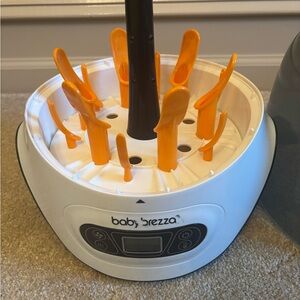 Baby Brezza Bottle Sterilizer and Washer with Orange Racks